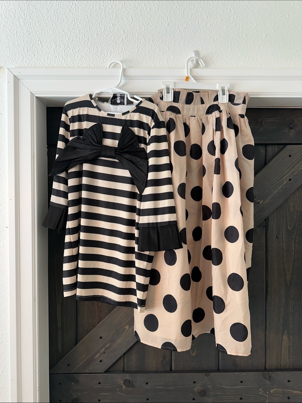 Dainty Jewells Black and Cream Striped Top with Front Bow Detail